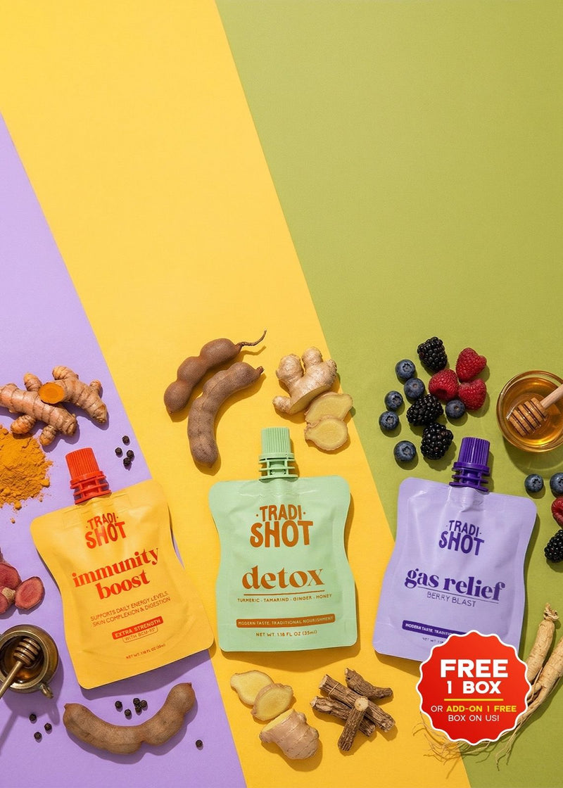 Three bottles of 'Tradishot' products on a colorful background with natural ingredients.
